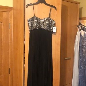 Black, pleated, strapless formal dress